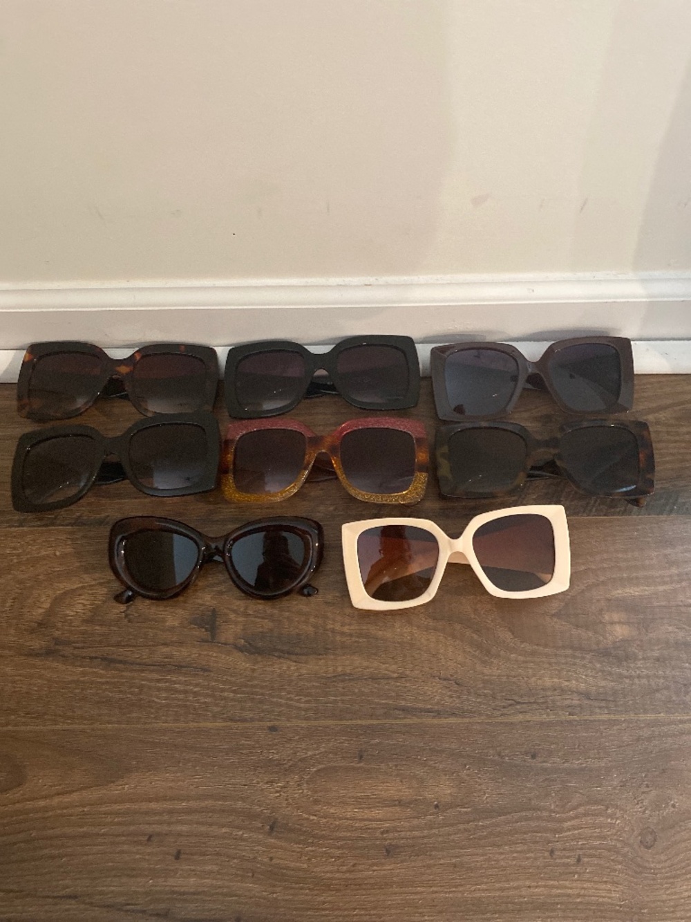 8 pairs of sunglasses